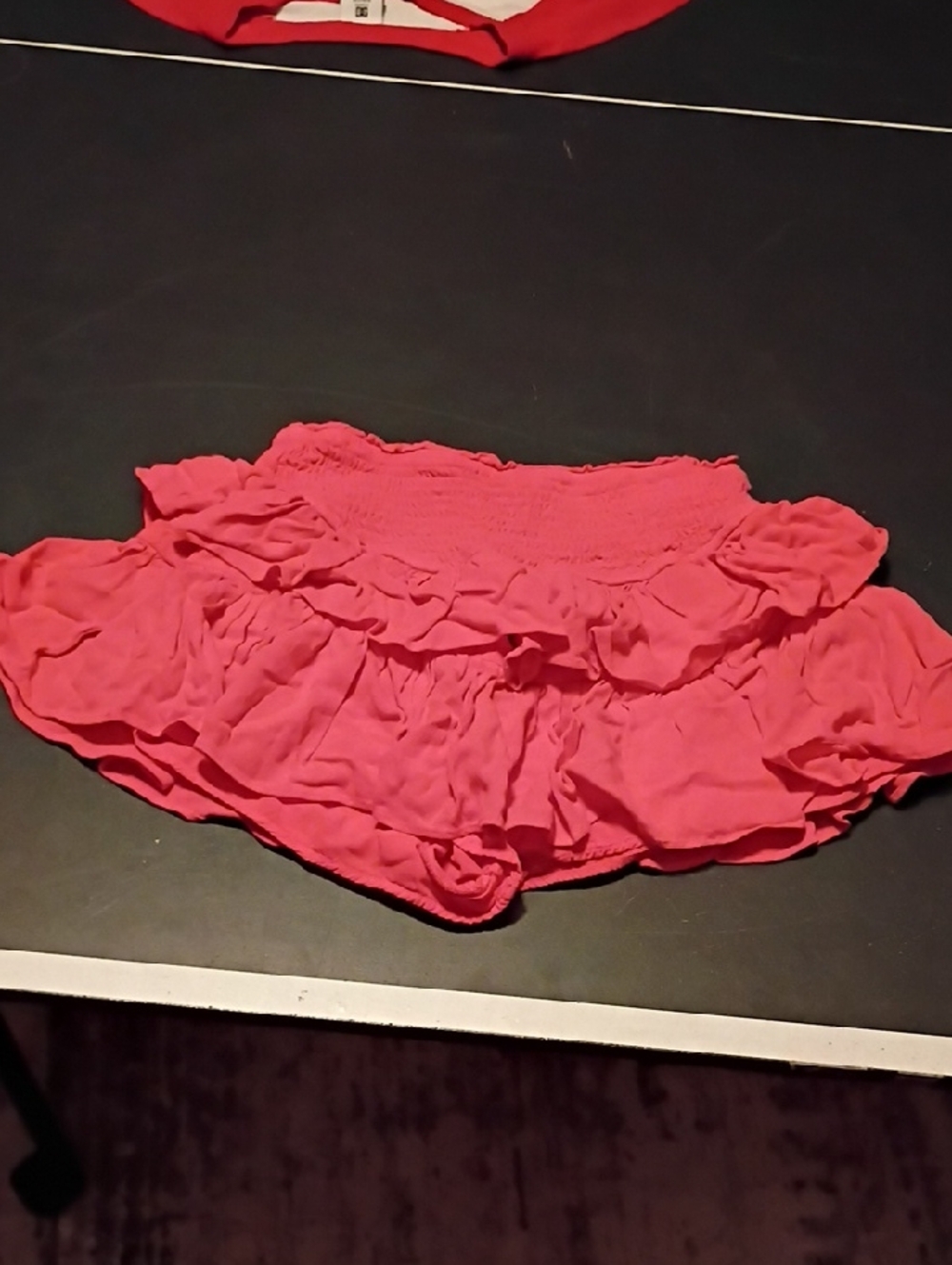 Ruffled Mini Skirt in Coral Pink with Smocked Waist